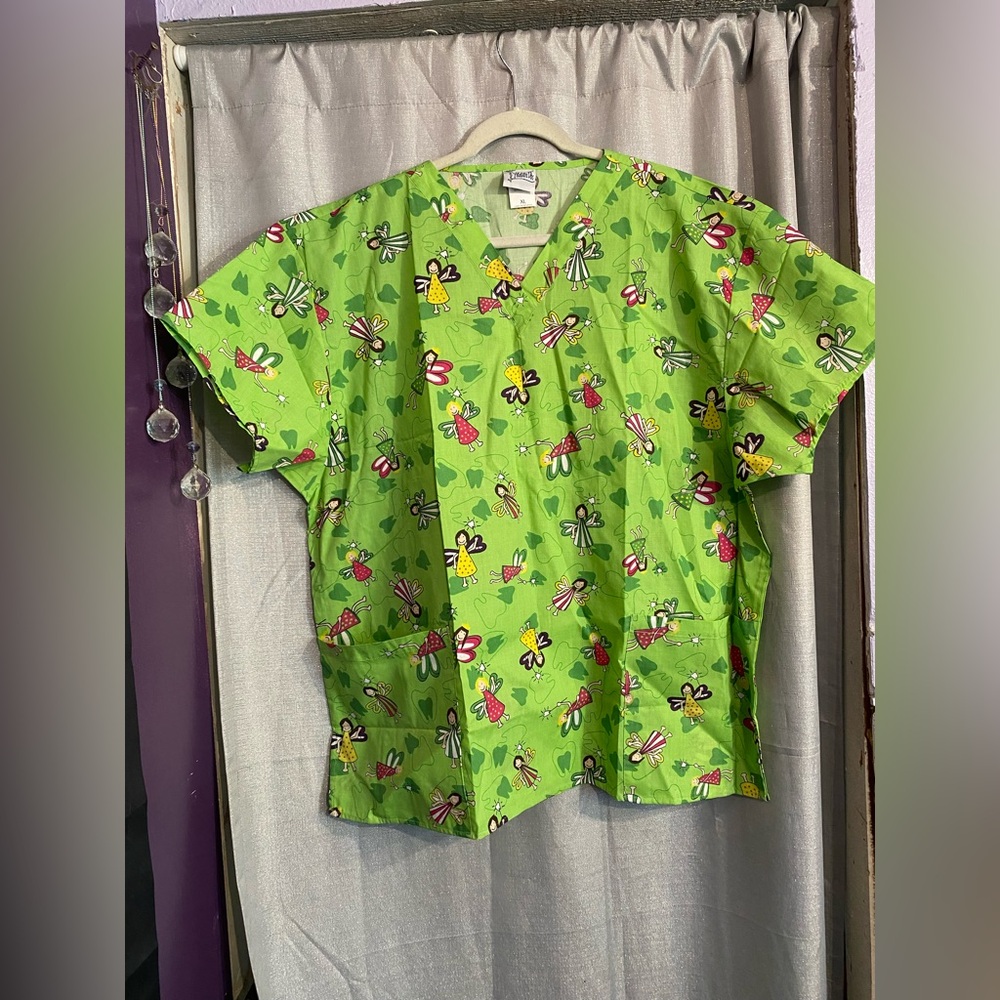 Mailbu doc Green and Red Short Sleeve scrub tooth fairy design